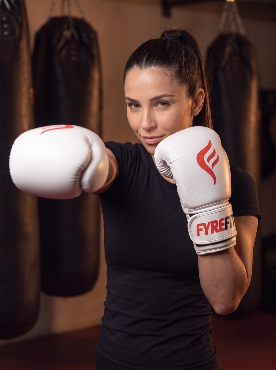 Fyrefit Boxing Gloves (White), throwing a jab