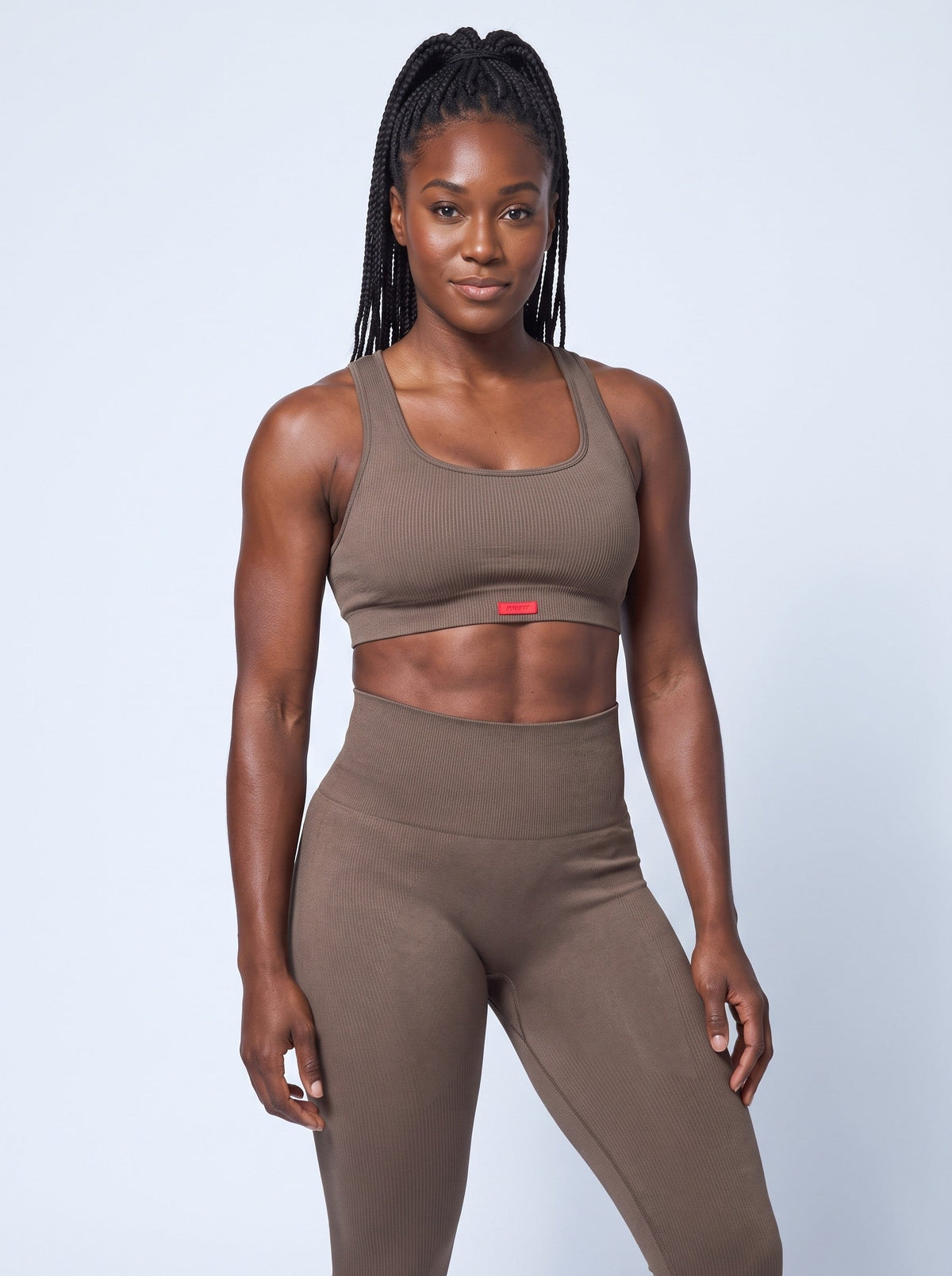 Lava Sports Bra Top in Taupe, worn as a set with the Lava Leggings