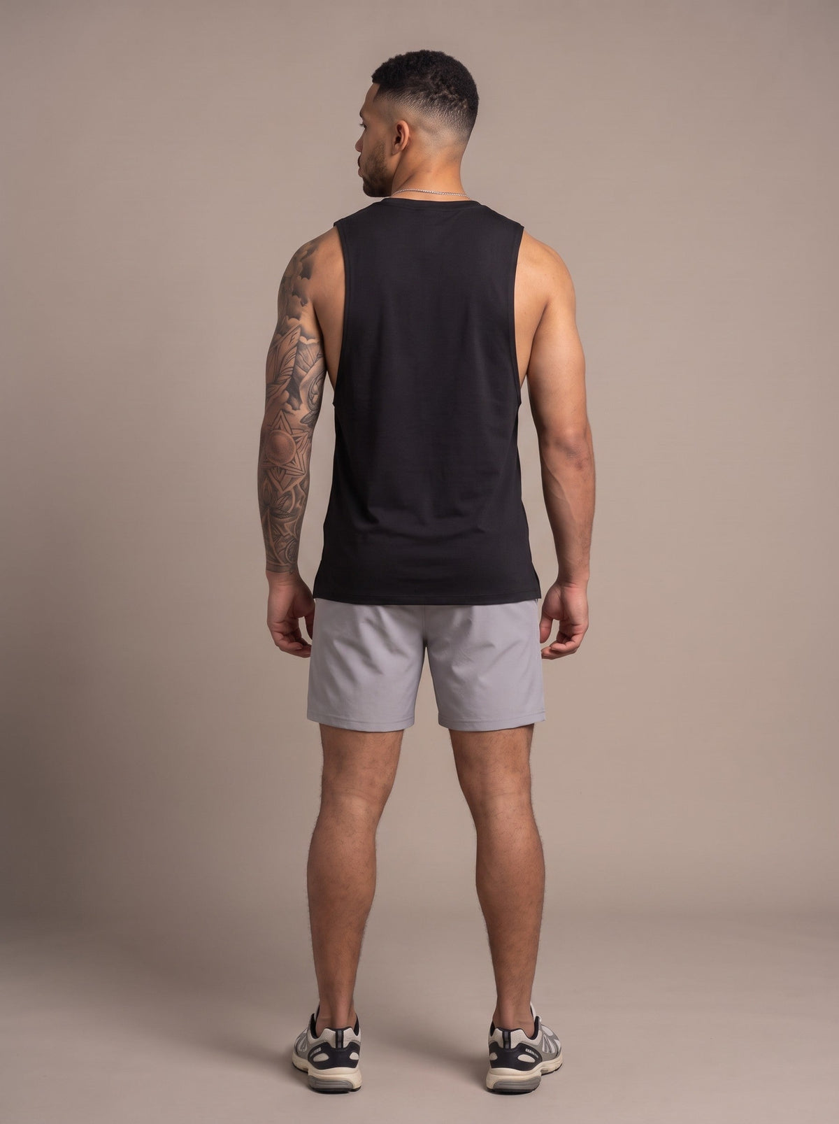 Men's Performance Tank in Black, back, on model