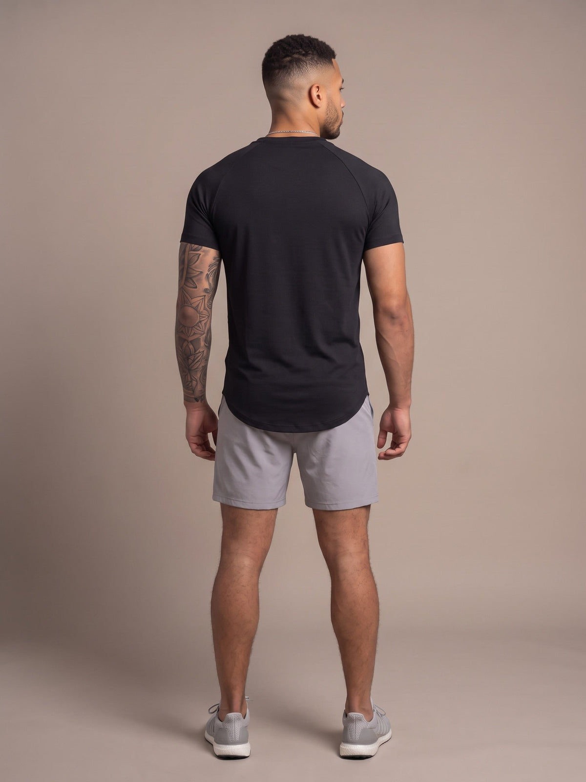 Men's Performance Tee in Black, back, on model