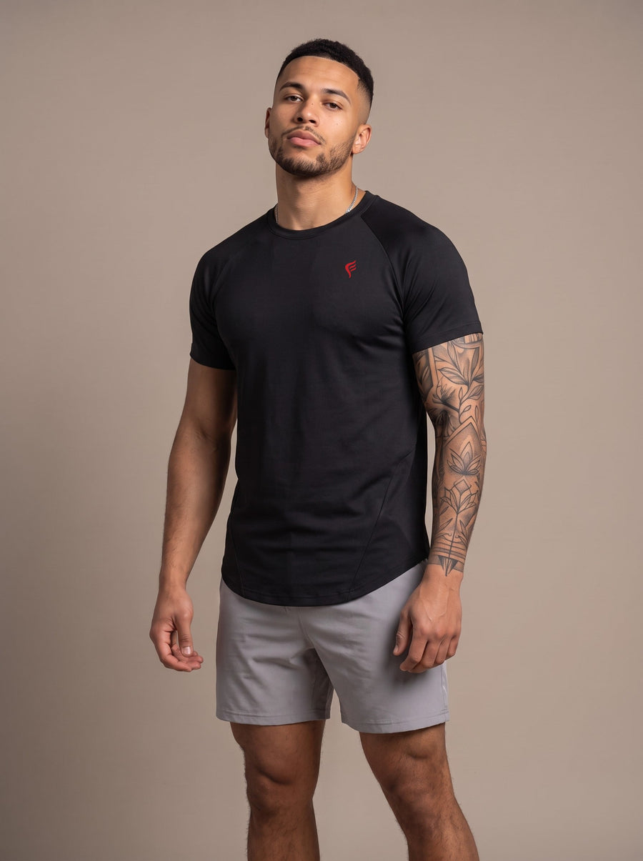 Men's Performance Tee in Black, front, on model