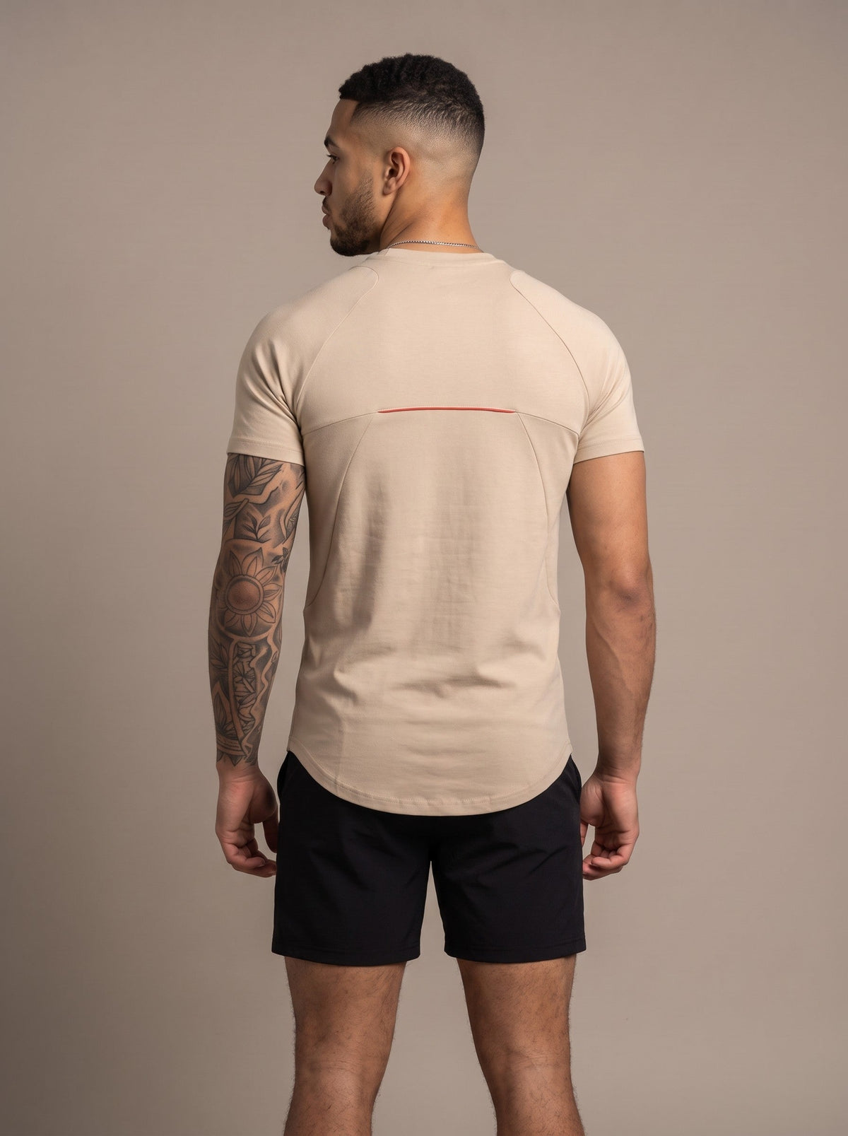 Men's Performance Tee in Macadamia, back, on model