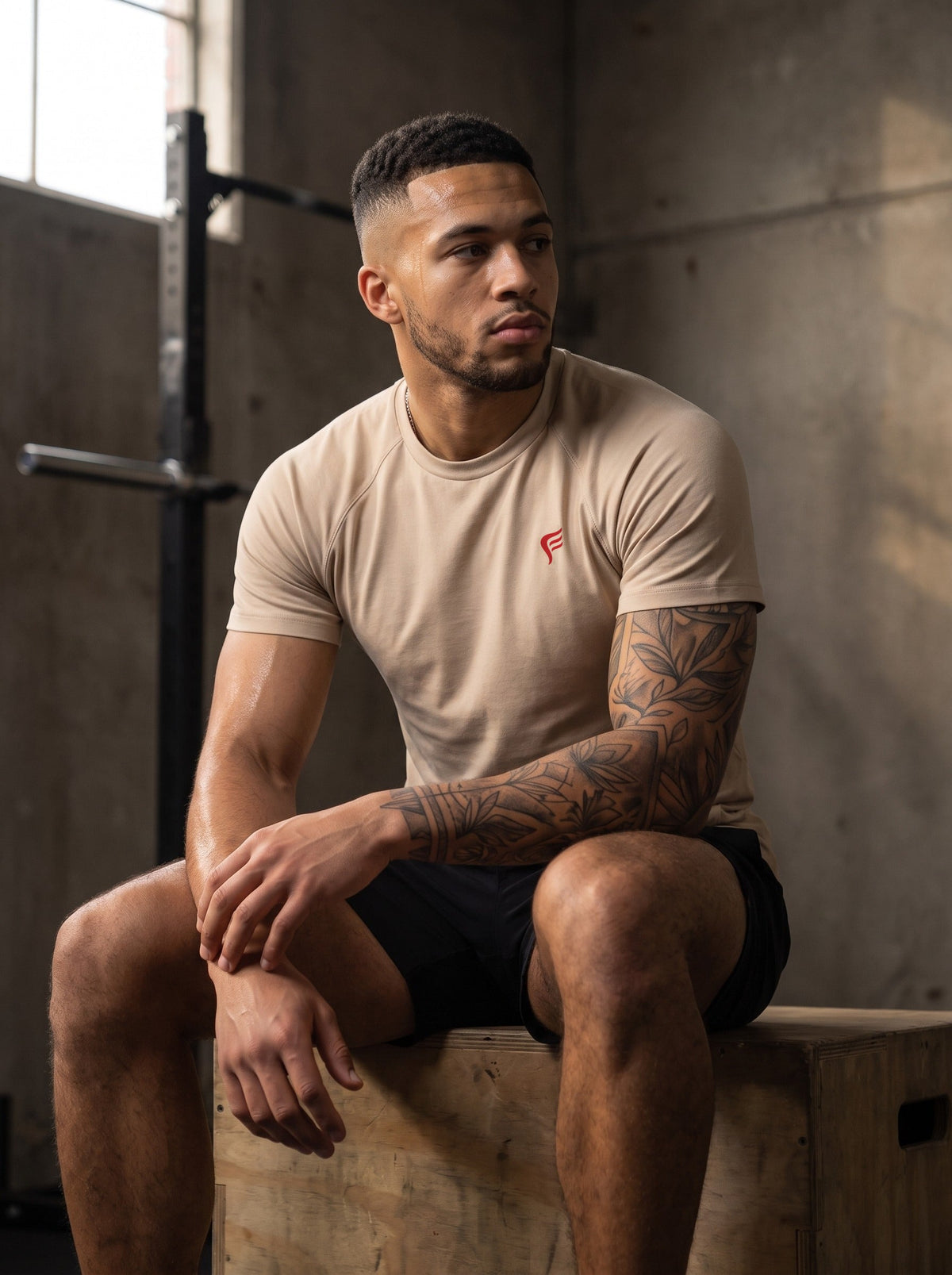Men's Performance Tee in Macadamia, in the gym
