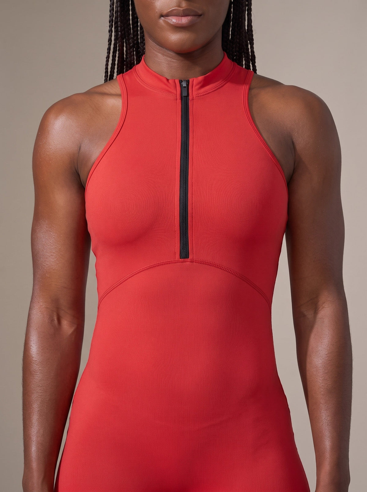 Women's Racerback Bodysuit in Red, zip front close-up