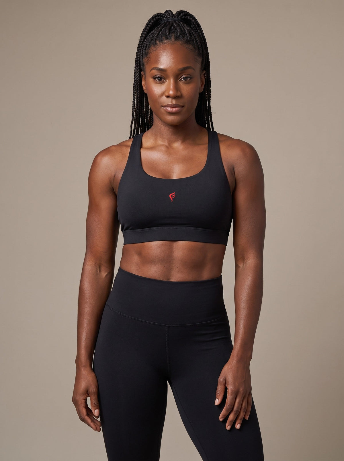 Women's Racerback Sports Bra in Black, front, on model