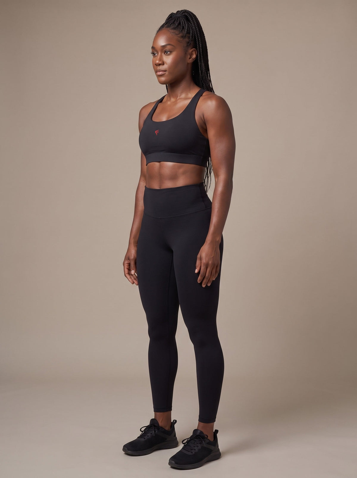 Women's Racerback Sports Bra in Black, side, on model