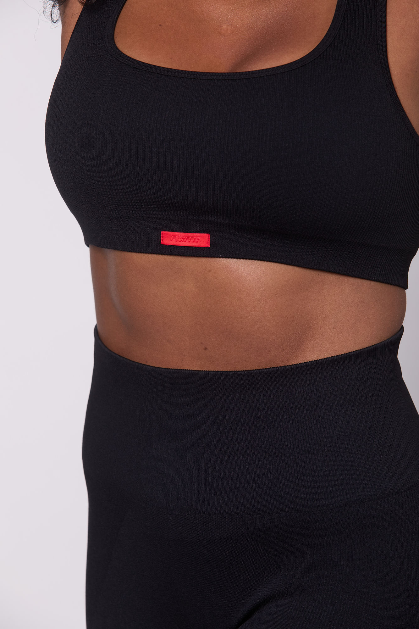 Fyrefit apparel — black sports bra detail